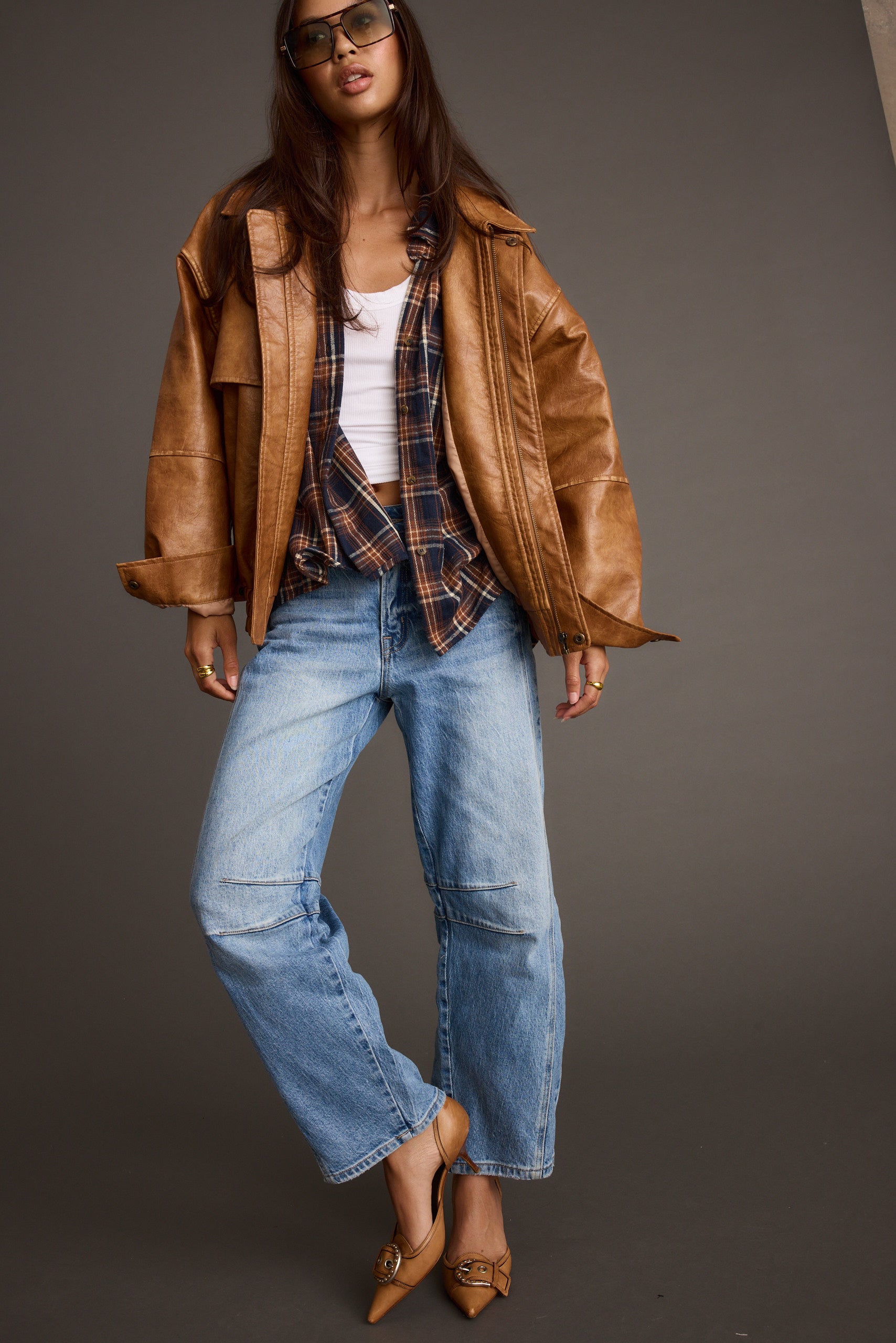 Koňaková nadměrná bunda London Calling z umělé kůže