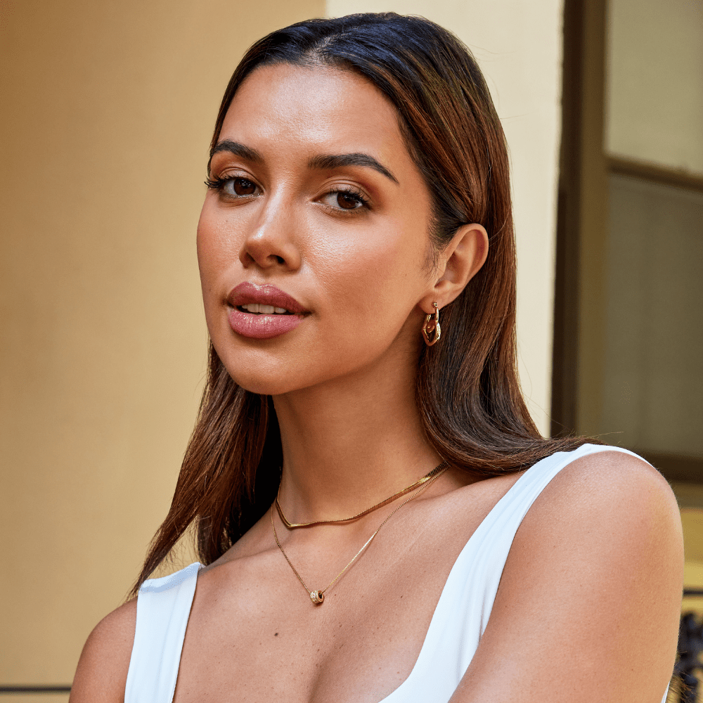 Lira Twisted Heart Hoop Earrings